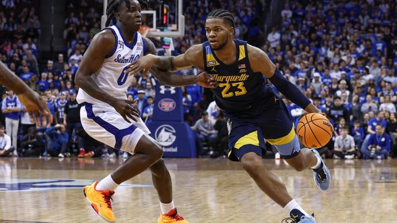 Jan 21, 2023; Newark, New Jersey, USA; Marquette Golden Eagles forward David Joplin (23) dribbles against Seton Hall Pirates guard Kadary Richmond (0) during the first half at Prudential Center. Mandatory Credit: Vincent Carchietta-USA TODAY Sports