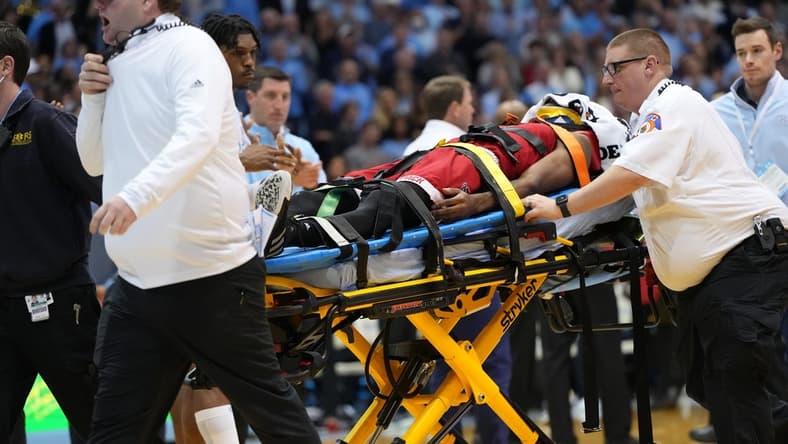 Jan 21, 2023; Chapel Hill, North Carolina, USA; North Carolina State Wolfpack guard Terquavion Smith (0) is taken off the court on a stretcher after being injured in the second half at Dean E. Smith Center. Mandatory Credit: Bob Donnan-USA TODAY Sports