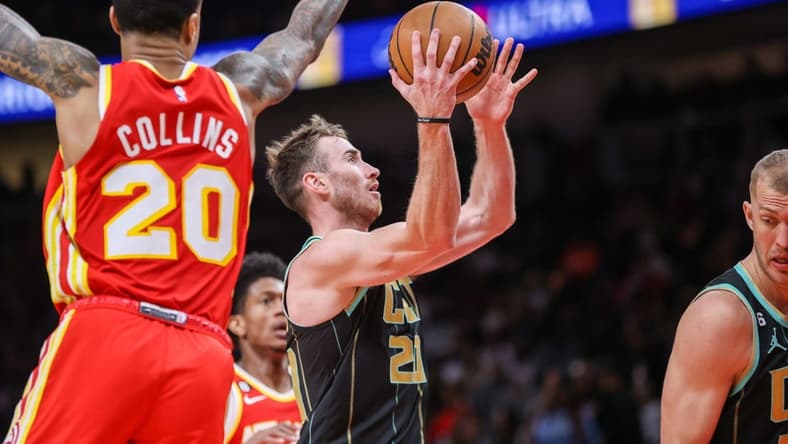 Jan 21, 2023; Atlanta, Georgia, USA; Charlotte Hornets forward Gordon Hayward (20) shoots against the Atlanta Hawks in the second quarter at State Farm Arena. Mandatory Credit: Brett Davis-USA TODAY Sports