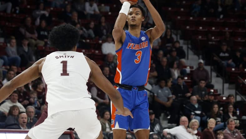 Jan 21, 2023; Starkville, Mississippi, USA; Florida Gators forward Alex Fudge (3) shoots for three during the first half against the Mississippi State Bulldogs at Humphrey Coliseum. Mandatory Credit: Petre Thomas-USA TODAY Sports
