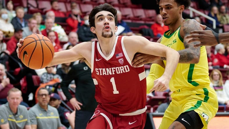 Jan 21, 2023; Stanford, California, USA; Stanford Cardinal guard Isa Silva (1) drives to the basket against Oregon Ducks guard Rivaldo Soares (11) during the first half at Maples Pavilion. Mandatory Credit: Robert Edwards-USA TODAY Sports