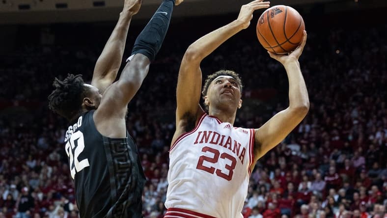 Jan 22, 2023; Bloomington, Indiana, USA; Indiana Hoosiers forward Trayce Jackson-Davis (23) shoots the ball while Michigan State Spartans center Mady Sissoko (22) defends in the first half at Simon Skjodt Assembly Hall. Mandatory Credit: Trevor Ruszkowski-USA TODAY Sports