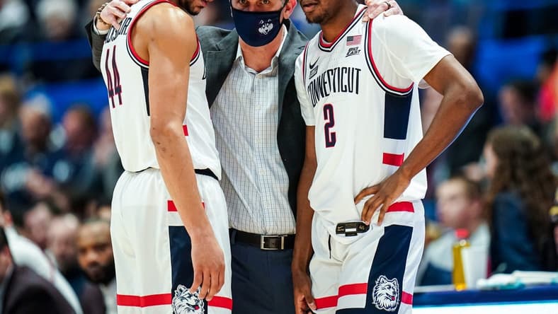 Jan 22, 2023; Hartford, Connecticut, USA; UConn Huskies head coach Dan Hurley talks to guard Tristen Newton (2) and guard Andre Jackson Jr. (44) from the sideline as they take on the Butler Bulldogs at XL Center. Mandatory Credit: David Butler II-USA TODAY Sports