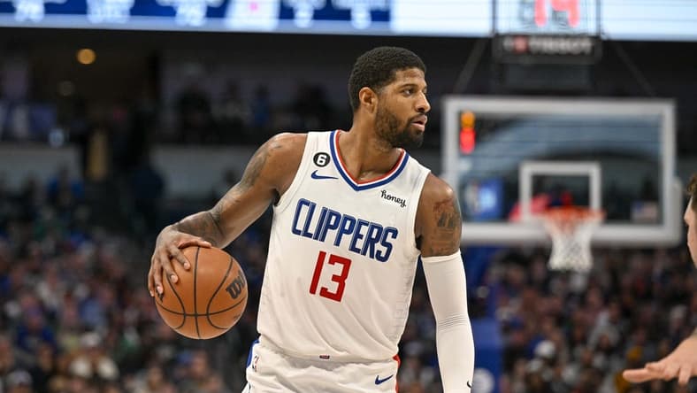 Jan 22, 2023; Dallas, Texas, USA; LA Clippers guard Paul George (13) brings the ball up court against the Dallas Mavericks during the second half at the American Airlines Center. Mandatory Credit: Jerome Miron-USA TODAY Sports