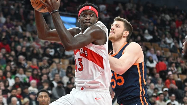 Jan 22, 2023; Toronto, Ontario, CAN; Toronto Raptors forward Pascal Siakam (43) takes in a rebound beside New York Knicks center Isaiah Hartenstein (55) in the first half at Scotiabank Arena. Mandatory Credit: Dan Hamilton-USA TODAY Sports