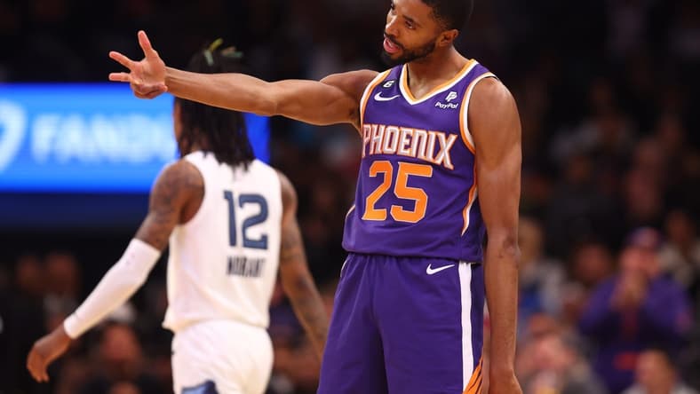 Jan 22, 2023; Phoenix, Arizona, USA; Phoenix Suns forward Mikal Bridges (25) celebrates a three point shot against the Memphis Grizzlies in the first half at Footprint Center. Mandatory Credit: Mark J. Rebilas-USA TODAY Sports