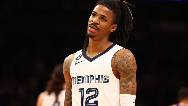 Jan 22, 2023; Phoenix, Arizona, USA; Memphis Grizzlies guard Ja Morant (12) reacts against the Phoenix Suns in the second half at Footprint Center. Mandatory Credit: Mark J. Rebilas-USA TODAY Sports