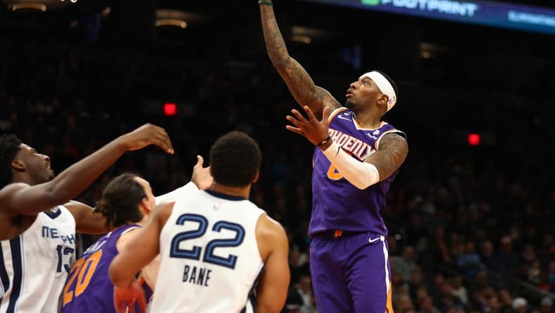 Jan 22, 2023; Phoenix, Arizona, USA; Phoenix Suns forward Torrey Craig (0) against the Memphis Grizzlies in the second half at Footprint Center. Mandatory Credit: Mark J. Rebilas-USA TODAY Sports