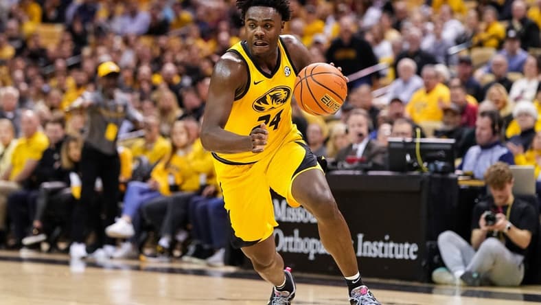 Jan 18, 2023; Columbia, Missouri, USA; Missouri Tigers guard Kobe Brown (24) dribbles the ball during the first half against the Arkansas Razorbacks at Mizzou Arena. Mandatory Credit: Jay Biggerstaff-USA TODAY Sports