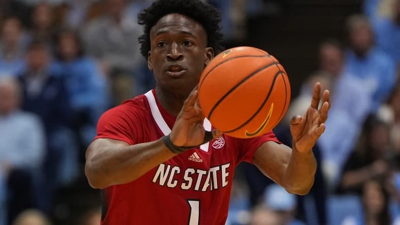 Jan 21, 2023; Chapel Hill, North Carolina, USA; North Carolina State Wolfpack guard Jarkel Joiner (1) passes the ball in the first half at Dean E. Smith Center. Mandatory Credit: Bob Donnan-USA TODAY Sports