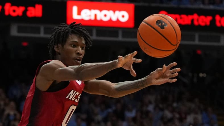 Jan 21, 2023; Chapel Hill, North Carolina, USA; North Carolina State Wolfpack guard Terquavion Smith (0) passes the ball in the first half at Dean E. Smith Center. Mandatory Credit: Bob Donnan-USA TODAY Sports