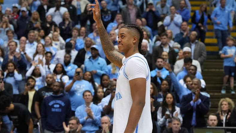 Jan 21, 2023; Chapel Hill, North Carolina, USA; North Carolina Tar Heels forward Armando Bacot (5) is recognized for becoming the all-time rebounding and double double leader after the game at Dean E. Smith Center. Mandatory Credit: Bob Donnan-USA TODAY Sports