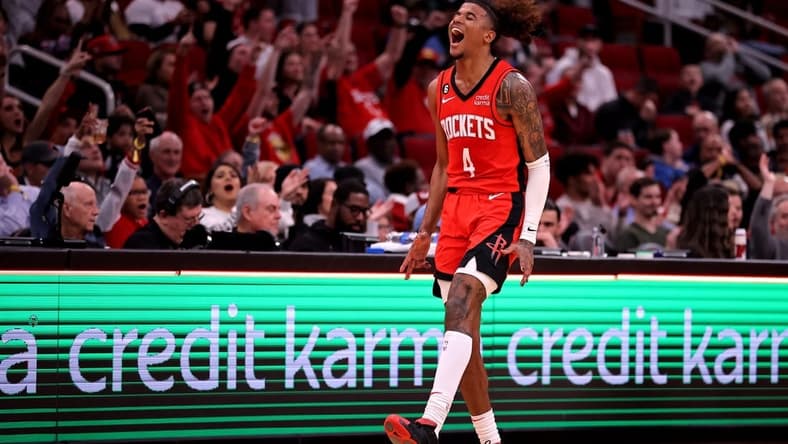 Jan 23, 2023; Houston, Texas, USA; Houston Rockets guard Jalen Green (4) reacts after making a three-point shot against the Minnesota Timberwolves during the third quarter at Toyota Center. Mandatory Credit: Erik Williams-USA TODAY Sports