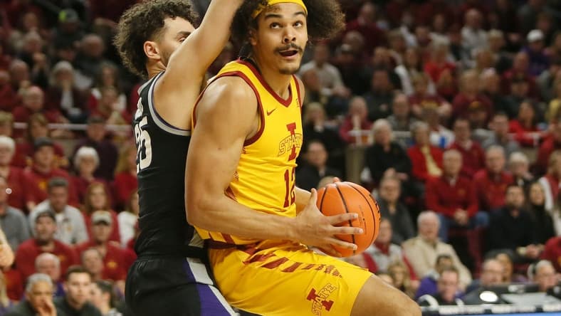 Iowa State University Cyclones forward Robert Jones (12) looks for a shot around Kansas State Wildcats forward Ismael Massoud (25) during the first half at Hilton Coliseum Tuesday, 2023, in Ames, Iowa.
Kansas State And Iowa State Men S Basketball