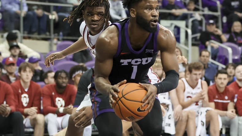 Jan 24, 2023; Fort Worth, Texas, USA; TCU Horned Frogs guard Mike Miles Jr. (1) grabs the ball in front of Oklahoma Sooners guard Otega Oweh (3) during the second half at Ed and Rae Schollmaier Arena. Mandatory Credit: Kevin Jairaj-USA TODAY Sports