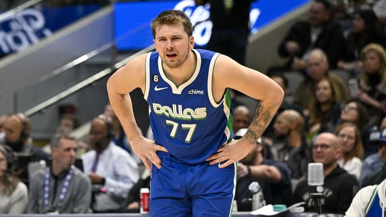 Jan 24, 2023; Dallas, Texas, USA; Dallas Mavericks guard Luka Doncic (77) reacts to receiving a technical foul during the second half against the Washington Wizards at the American Airlines Center. Mandatory Credit: Jerome Miron-USA TODAY Sports