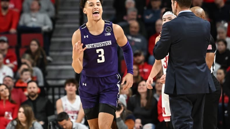 Jan 25, 2023; Lincoln, Nebraska, USA; Northwestern Wildcats guard Ty Berry (3) reacts after hitting a three point basket against the Nebraska Cornhuskers in the first half at Pinnacle Bank Arena. Mandatory Credit: Steven Branscombe-USA TODAY Sports