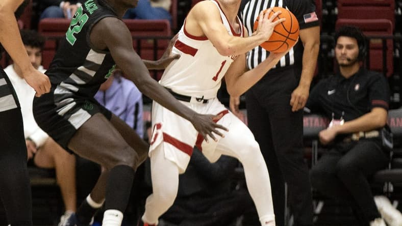 Jan 25, 2023; Stanford, California, USA; Chicago State Cougars forward Arol Kacuol (22) defends Stanford Cardinal guard Isa Silva (1) during the first half at Maples Pavilion. Mandatory Credit: D. Ross Cameron-USA TODAY Sports