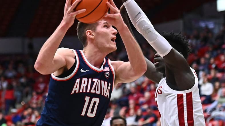 Jan 26, 2023; Pullman, Washington, USA;  Arizona Wildcats forward Azuolas Tubelis (10) shoots the ball against Washington State Cougars forward Mouhamed Gueye (35)in the first half at Friel Court at Beasley Coliseum. Mandatory Credit: James Snook-USA TODAY Sports