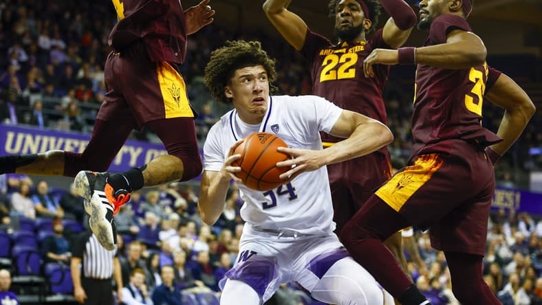 Jan 26, 2023; Seattle, Washington, USA; Washington Huskies center Braxton Meah (34) pump fakes against Arizona State Sun Devils guard Desmond Cambridge Jr. (4), forward Warren Washington (22) and guard Devan Cambridge (35) during the first half at Alaska Airlines Arena at Hec Edmundson Pavilion. Mandatory Credit: Joe Nicholson-USA TODAY Sports