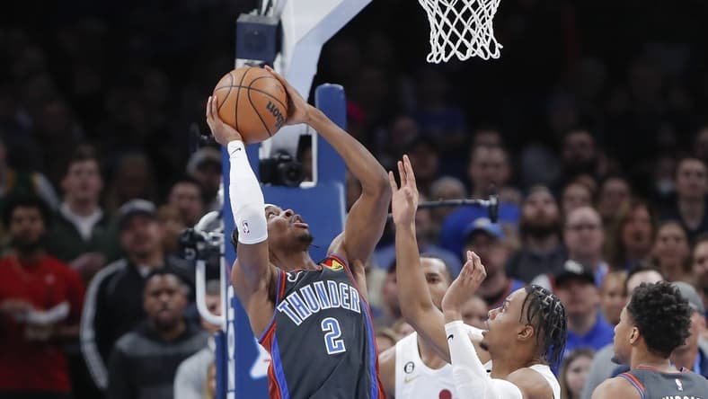 Jan 27, 2023; Oklahoma City, Oklahoma, USA; Oklahoma City Thunder guard Shai Gilgeous-Alexander (2) shoots against the Cleveland Cavaliers during the first quarter at Paycom Center. Mandatory Credit: Alonzo Adams-USA TODAY Sports