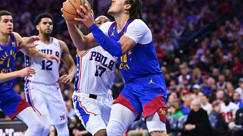 Jan 28, 2023; Philadelphia, Pennsylvania, USA; Denver Nuggets forward Aaron Gordon (50) drives against Philadelphia 76ers forward P.J. Tucker (17) in the first quarter at Wells Fargo Center. Mandatory Credit: Kyle Ross-USA TODAY Sports