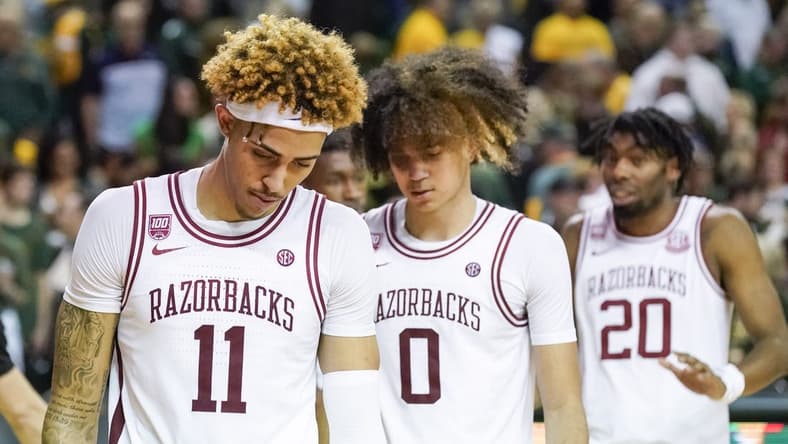 Jan 28, 2023; Waco, Texas, USA; Arkansas Razorbacks forward Jalen Graham (11) and guard Anthony Black (0) leave the court following the game against the Baylor Bears  at Ferrell Center. Mandatory Credit: Raymond Carlin III-USA TODAY Sports