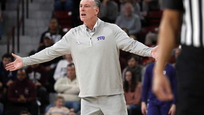 Jan 28, 2023; Starkville, Mississippi, USA; TCU Horned Frogs head coach Jamie Dixon reacts after a foul call during the second half against the Mississippi State Bulldogs at Humphrey Coliseum. Mandatory Credit: Petre Thomas-USA TODAY Sports