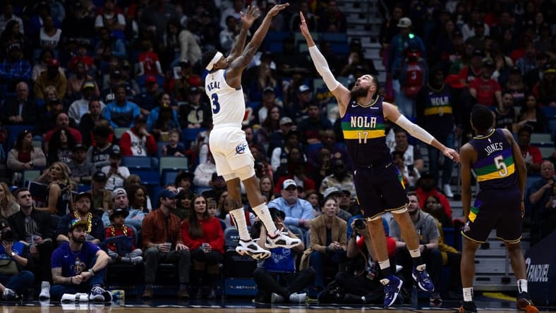 Jan 28, 2023; New Orleans, Louisiana, USA; Washington Wizards guard Bradley Beal (3) shoots a jump shot over New Orleans Pelicans center Jonas Valanciunas (17) during the first half at Smoothie King Center. Mandatory Credit: Stephen Lew-USA TODAY Sports