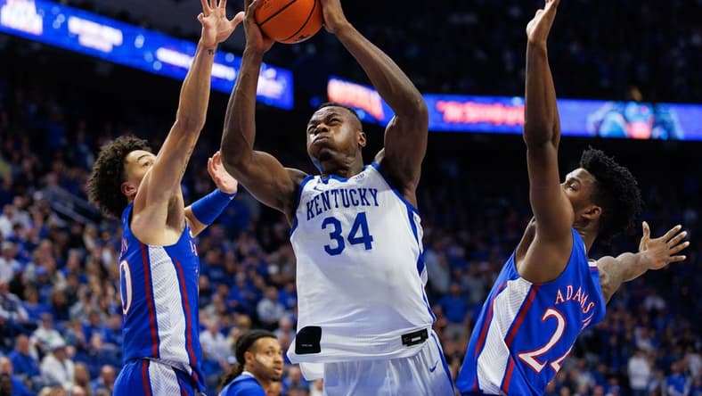 Jan 28, 2023; Lexington, Kentucky, USA; Kentucky Wildcats forward Oscar Tshiebwe (34) goes to the basket during the second half against the Kansas Jayhawks at Rupp Arena at Central Bank Center. Mandatory Credit: Jordan Prather-USA TODAY Sports