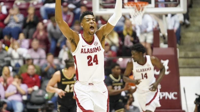 Jan 31, 2023; Tuscaloosa, Alabama, USA; Alabama Crimson Tide forward Brandon Miller (24) reacts after hitting a three pointer against the Vanderbilt Commodores during the first half at Coleman Coliseum. Mandatory Credit: Marvin Gentry-USA TODAY Sports