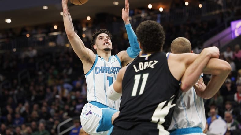 Jan 31, 2023; Milwaukee, Wisconsin, USA;  Charlotte Hornets guard LaMelo Ball (1) shoots during the third quarter against the Milwaukee Bucks at Fiserv Forum. Mandatory Credit: Jeff Hanisch-USA TODAY Sports