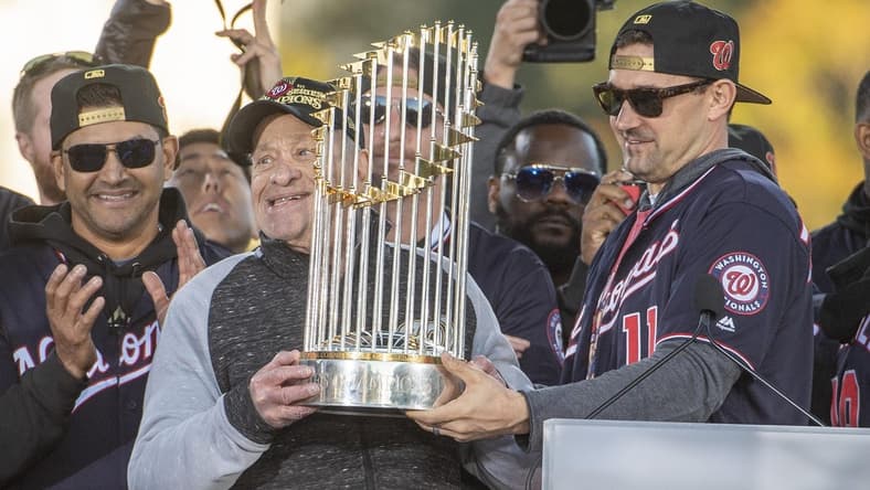 Nov 2, 2019; Washington, DC, USA; Washington Nationals owner Ted Lerner and Washington Nationals first baseman Ryan Zimmerman (11) hold the trophy at World Series Championship Parade. Mandatory Credit: Brad Mills-USA TODAY Sports