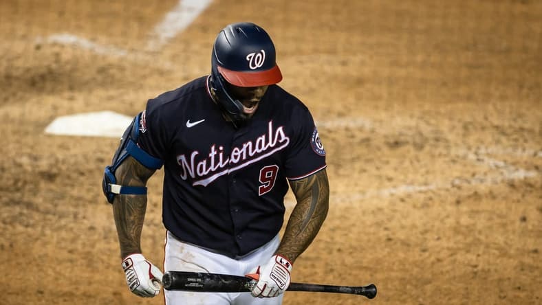 Sep 11, 2020; Washington, District of Columbia, USA; Washington Nationals first baseman Eric Thames (9) reacts against the Atlanta Braves during the ninth inning at Nationals Park. Mandatory Credit: Scott Taetsch-USA TODAY Sports