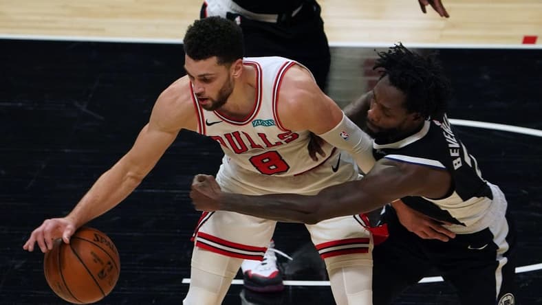 Jan 10, 2021; Los Angeles, California, USA; Chicago Bulls guard Zach LaVine (8) and LA Clippers guard Patrick Beverley (21) battle for the ball in the first half at Staples Center. Mandatory Credit: Kirby Lee-USA TODAY Sports