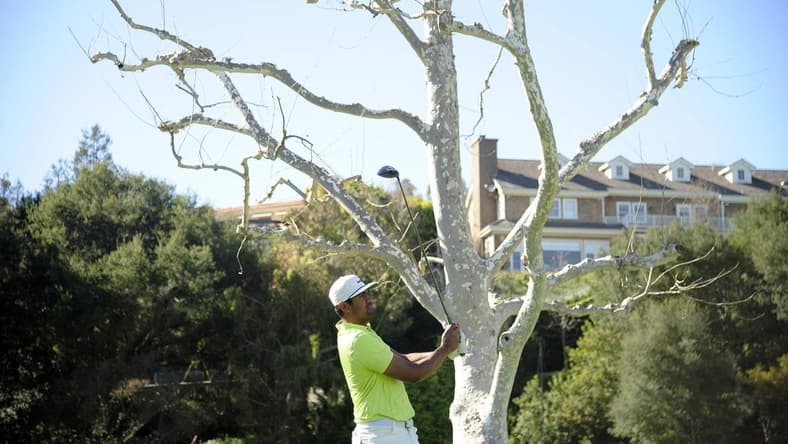 Feb 21, 2021; Pacific Palisades, California, USA; Tony Finau hits from the seventeenth hole tee box during the final round of The Genesis Invitational golf tournament at Riviera Country Club. Mandatory Credit: Gary A. Vasquez-USA TODAY Sports
