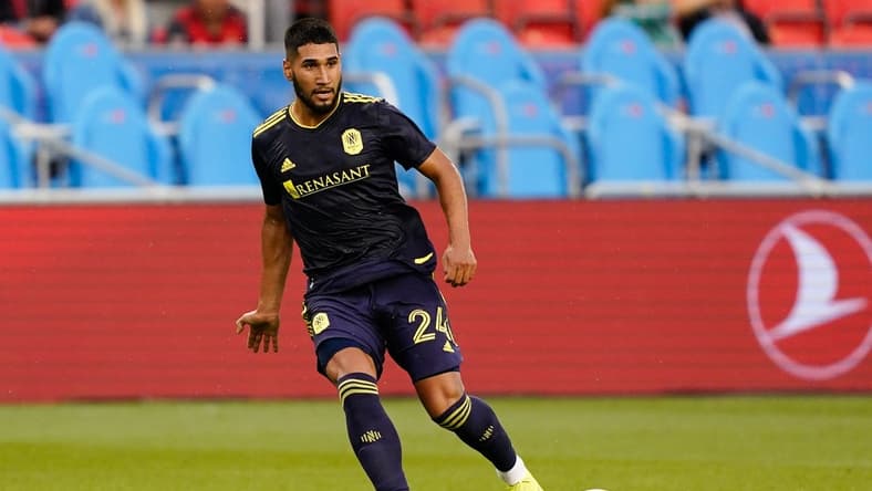 Aug 1, 2021; Toronto, Ontario, CAN; Nashville SC defender Robert Castellanos (24) passes the ball against Toronto FC at BMO Field. Mandatory Credit: Kevin Sousa-USA TODAY Sports