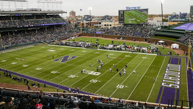 Nov 20, 2021; Chicago, Illinois, USA; A general view as Purdue Boilermakers punter Jack Ansell (30) punts the ball against the Northwestern Wildcats during the first quarter at Wrigley Field. Mandatory Credit: Jon Durr-USA TODAY Sports