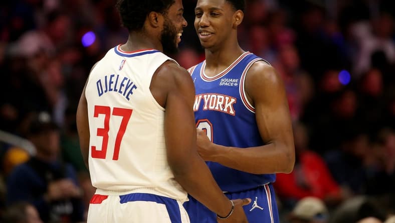 Mar 6, 2022; Los Angeles, California, USA; New York Knicks guard RJ Barrett (9) talks with Los Angeles Clippers forward Semi Ojeleye (37) during the second half at Crypto.com Arena. The Knicks won 116-93. Mandatory Credit: Kiyoshi Mio-USA TODAY Sports