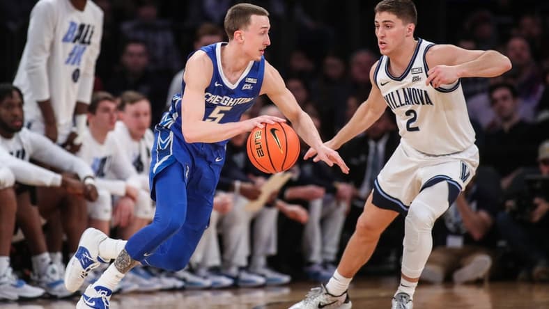 Mar 12, 2022; New York, NY, USA; Creighton Bluejays guard Alex O'Connell (5) and Villanova Wildcats guard Collin Gillespie (2) at the Big East Tournament at Madison Square Garden. Mandatory Credit: Wendell Cruz-USA TODAY Sports