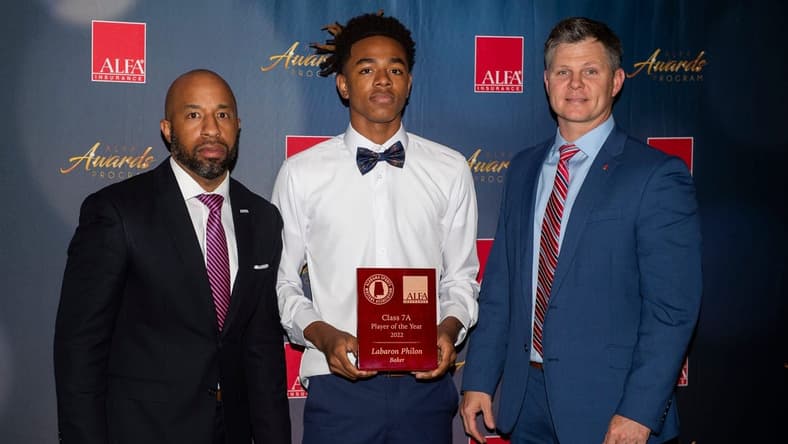 Boys class 7A player of the year Labaron Philon of Baker poses for a photo with AHSAA Associate Director Brandon Dean, left, and Matt Cobb of ALFA insurance, right during the Alabama Sports Writers Association awards banquet at the Renaissance Hotel in Montgomery, Ala., on Thursday, March 31, 2022.
