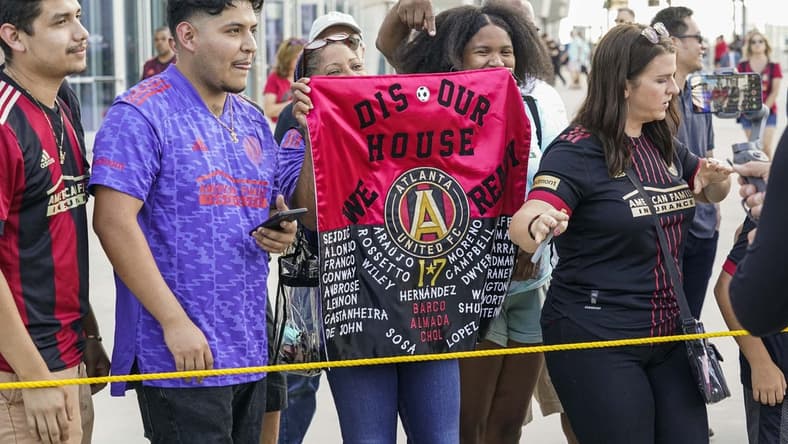 May 28, 2022; Atlanta, Georgia, USA; Atlanta United fans wait to greet their players on the way into the stadium before the match against the Columbus Crew at Mercedes-Benz Stadium. Mandatory Credit: Dale Zanine-USA TODAY Sports