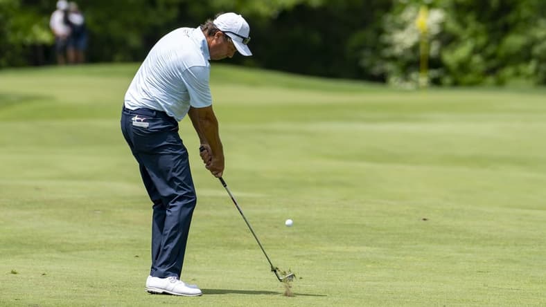 May 29, 2022; Benton Harbor, Michigan, USA; Stephen Ames hits his approach shot from the first fairway during the final round of the 2022 KitchenAid Senior PGA Championship at Harbor Shores. Mandatory Credit: Raj Mehta-USA TODAY Sports