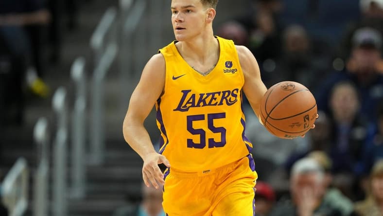 Jul 2, 2022; San Francisco, CA, USA; Los Angeles Lakers guard Mac McClung (55) dribbles against the Miami Heat during the fourth quarter at the California Summer League at Chase Center. Mandatory Credit: Darren Yamashita-USA TODAY Sports