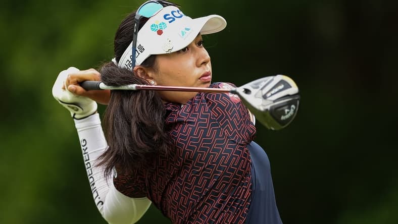 Jun 23, 2022; Bethesda, Maryland, USA; Atthaya Thitikul plays her shot from the 11th tee during the first round of the KPMG Women's PGA Championship golf tournament at Congressional Country Club. Mandatory Credit: Scott Taetsch-USA TODAY Sports