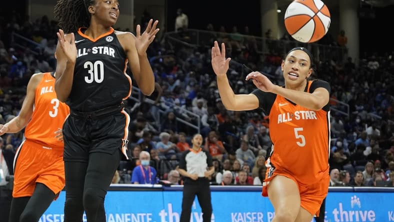 Jul 10, 2022; Chicago, Ill, USA; Team Stewart center Nneka Ogwumike (3) and Team Wilson guard Dearica Hammy (5) go for the ball during the first half in a WNBA All Star Game at Wintrust Arena. Mandatory Credit: David Banks-USA TODAY Sports