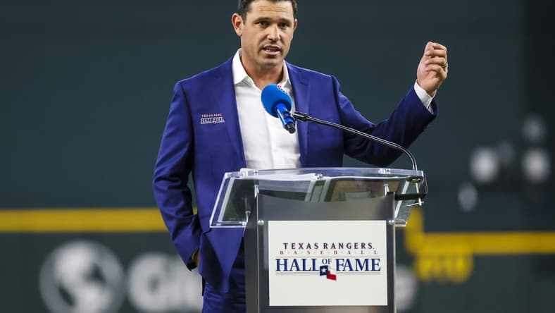 Aug 13, 2022; Arlington, Texas, USA; Texas Rangers former player Ian Kinsler gives a speech after being inducted into the Texas Rangers hall of fame before the game against the Seattle Mariners at Globe Life Field. Mandatory Credit: Kevin Jairaj-USA TODAY Sports