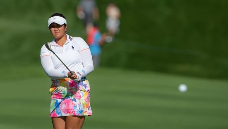 Aug 27, 2022; Ottawa, Ontario, CAN; Lilia Vu from the United States  follows the ball as she gets it onto the green of the 18th hole during the third round of the CP Women's Open golf tournament. Mandatory Credit: Marc DesRosiers-USA TODAY Sports