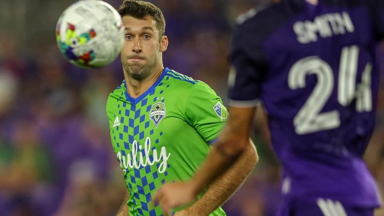 Aug 31, 2022; Orlando, Florida, USA;  Seattle Sounders defender Will Bruin (17) tracks down ball against Orlando City in the second half at Exploria Stadium. Mandatory Credit: Nathan Ray Seebeck-USA TODAY Sports