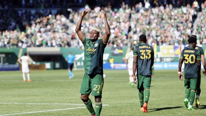 Oct 2, 2022; Portland, Oregon, USA; Portland Timbers forward Dairon Asprilla (27) celebrates after scoring a goal during the second half against the LAFC at Providence Park. Mandatory Credit: Soobum Im-USA TODAY Sports